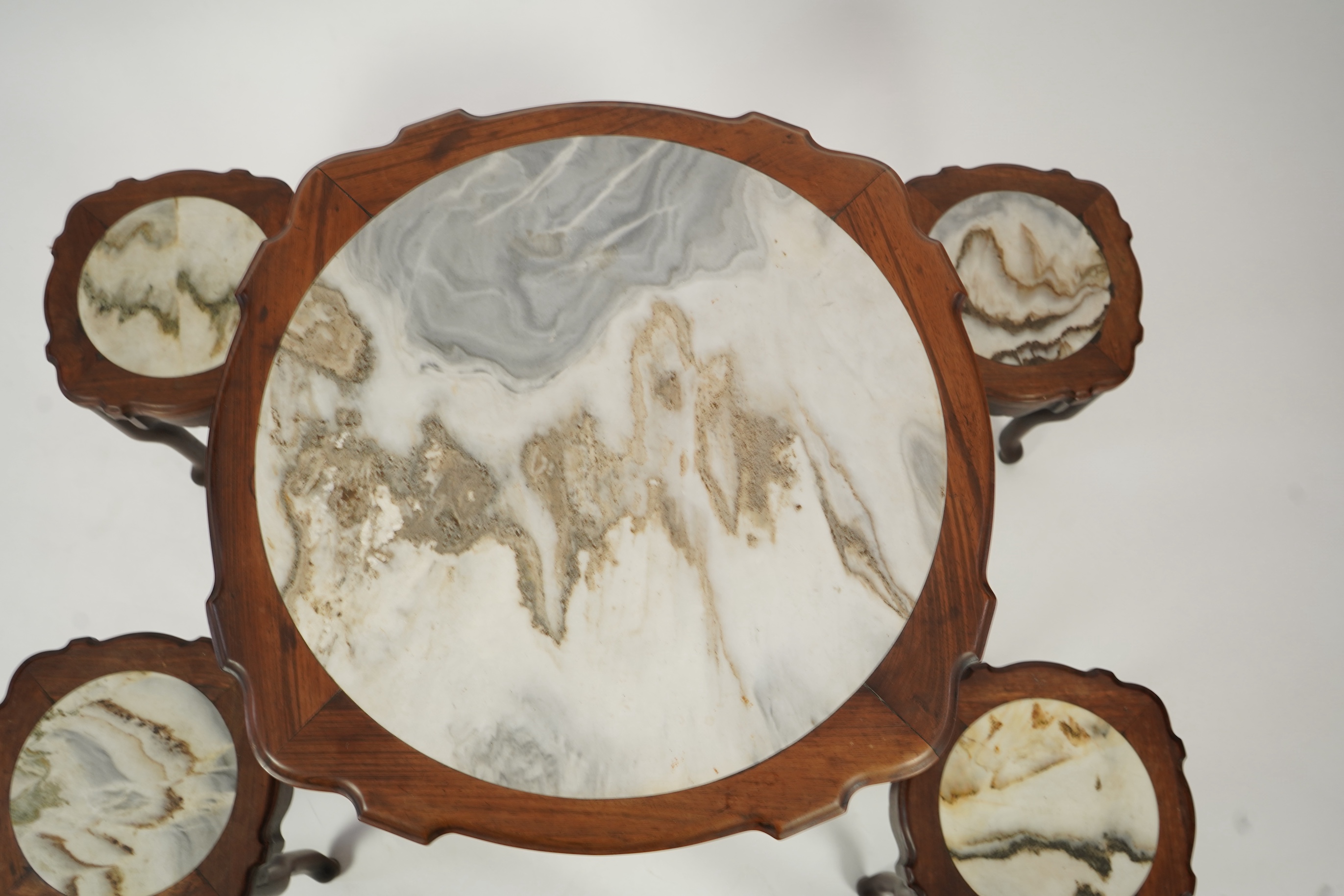A Chinese dreamstone marble inset hongmu table and four matching stools